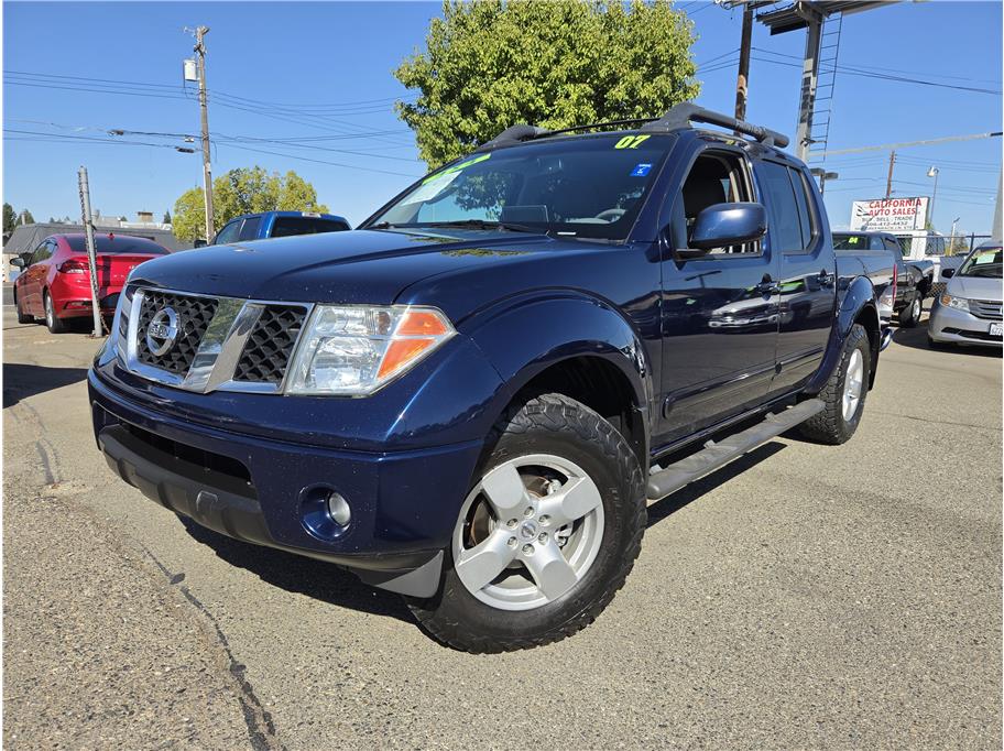 Metallic Blue 2007 Nissan Frontier Pickup Truck Four-Wheel Drive Automatic