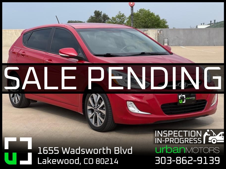 Red 2015 Hyundai Accent Hatchback Front-Wheel Drive 6-Speed Automatic Overdrive