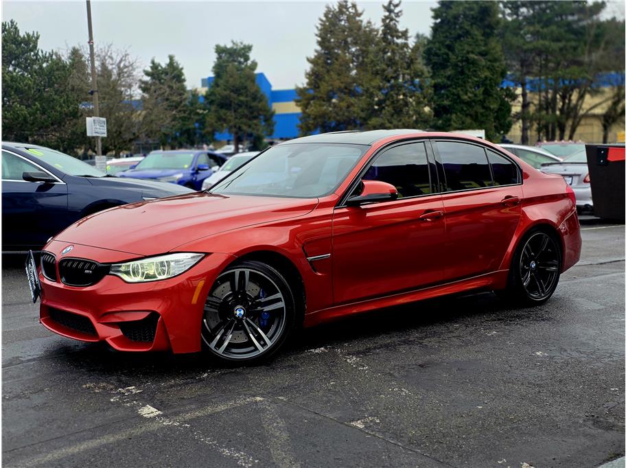 Orange 2016 BMW M3 Sedan RWD Sedan Rear-Wheel Drive 6-Speed Manual