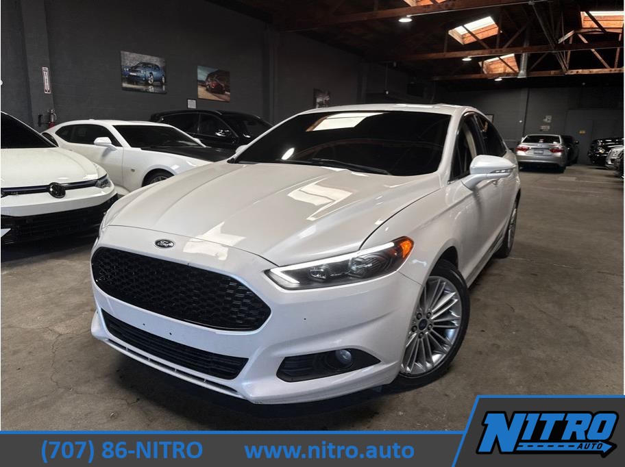 White 2015 Ford Fusion Sedan Front-Wheel Drive 6-Speed Automatic