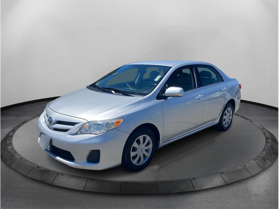 Silver 2011 Toyota Corolla LE Sedan Front-Wheel Drive 4-Speed Automatic Overdrive