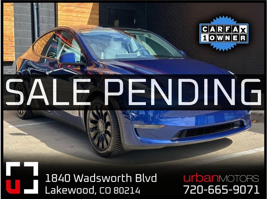 2023 Tesla Model Y from Urban Motors Red