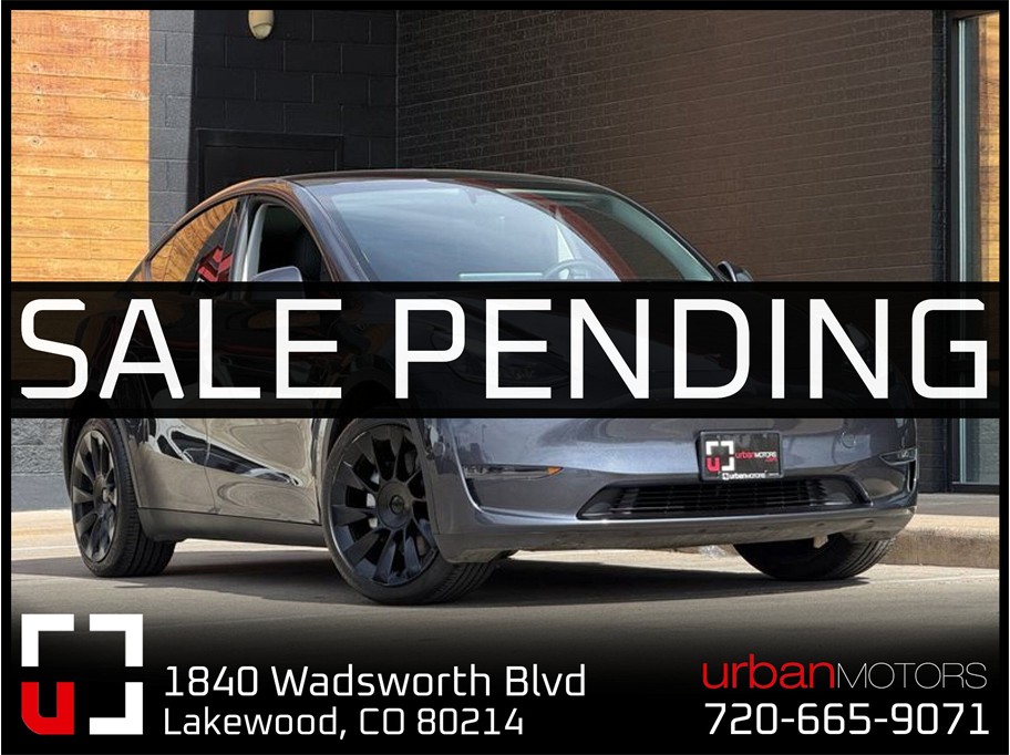 2024 Tesla Model Y from Urban Motors Red